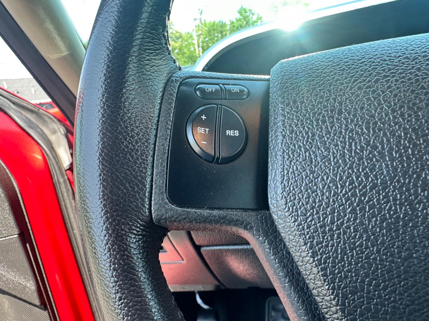 2009 Red /black Ford Explorer XLT (1FMEU73E89U) with an 4.0L V6 engine, 5-Speed Automatic transmission, located at 11115 Chardon Rd. , Chardon, OH, 44024, (440) 214-9705, 41.580246, -81.241943 - This 2009 Ford Explorer is a reliable and capable SUV, offering a 4.0L V6 engine paired with a 5-speed automatic transmission and full-time 4WD system. With a 3,500-pound towing capacity, it's suitable for moderate hauling needs. Additionally, the power driver's seat provides comfort and convenience - Photo#17